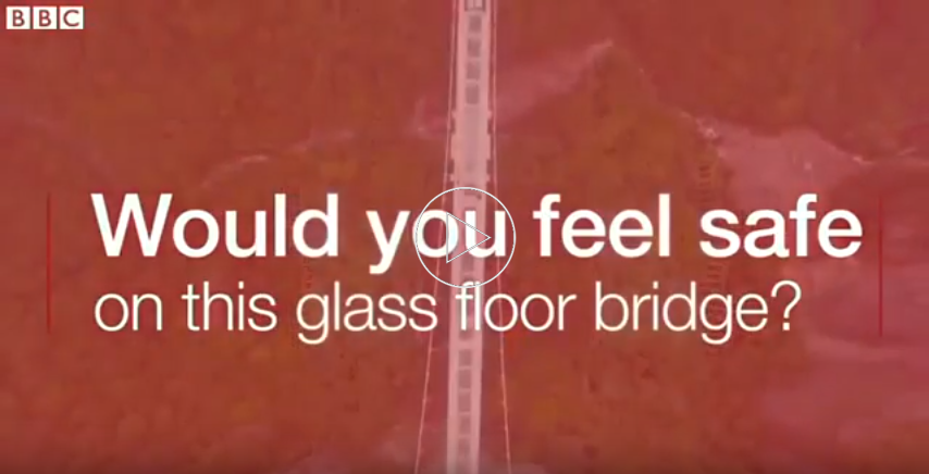 Checking the world’s highest glass bridge with a hammer