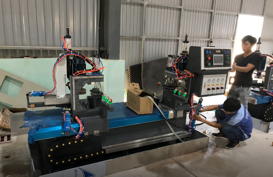 PHU SON Corporation HCM installs 2 GLASFULL glass corner grinding machines at BAO PHAT GLASS